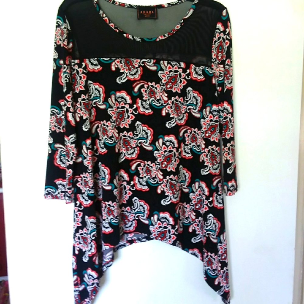 AMANA ladies top in size medium.